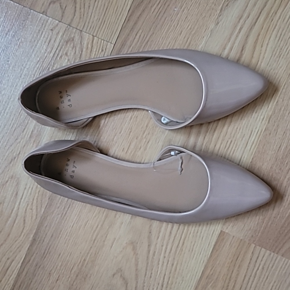 A New Day Flats